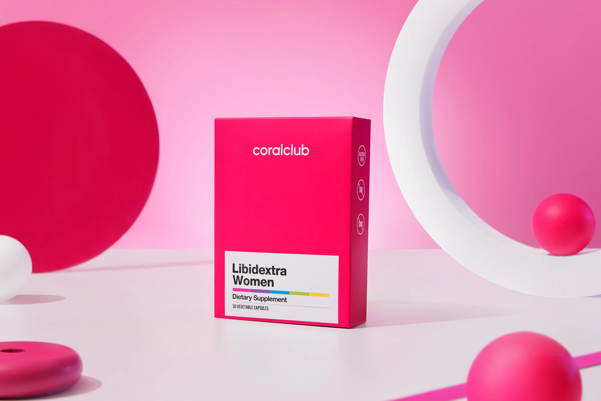 Packaging of the Libidextra Women complex against the background of fresh Damask rose petals