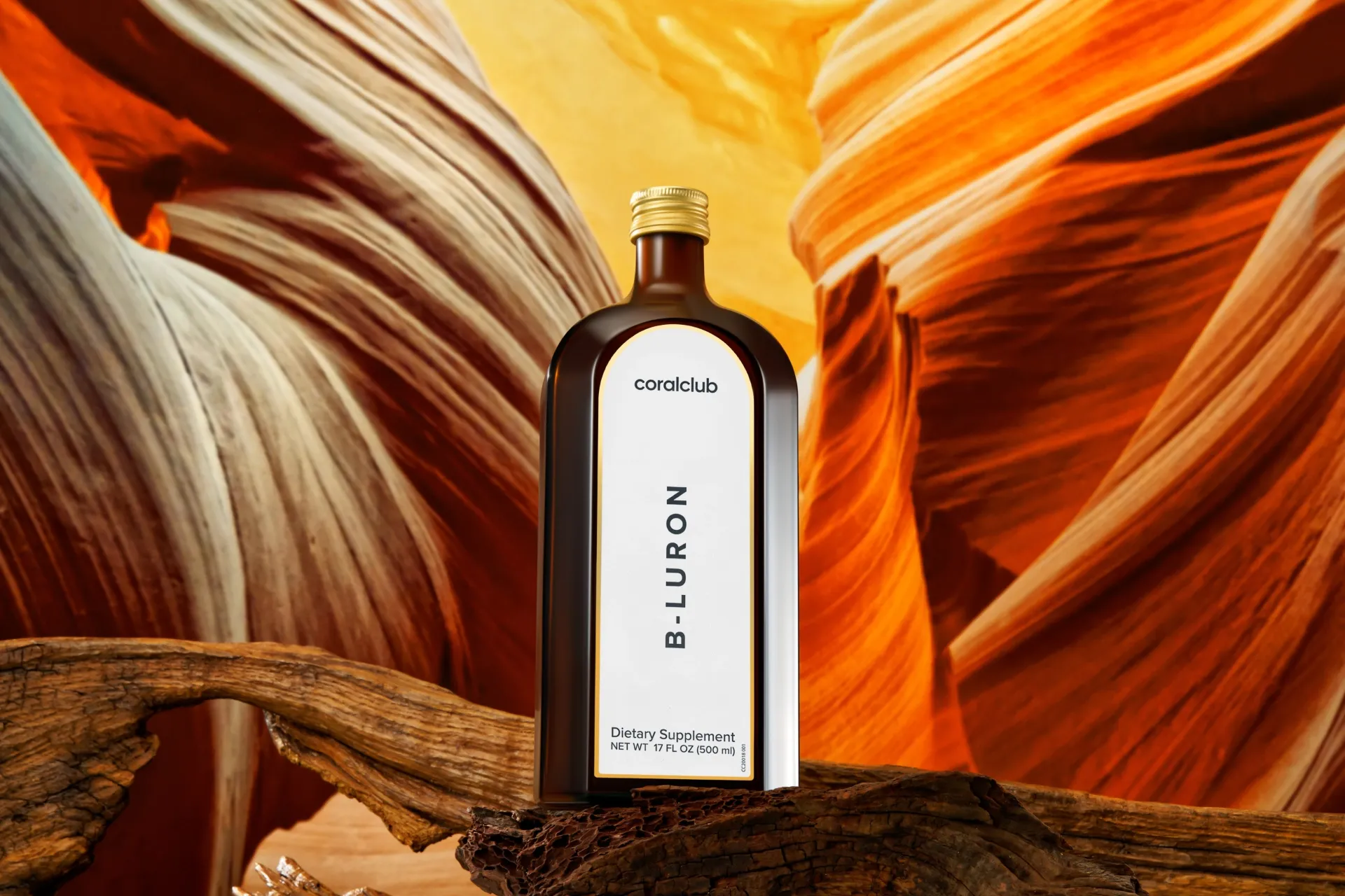 Measuring cup with B-Luron syrup in a lifestyle setting against natural textures