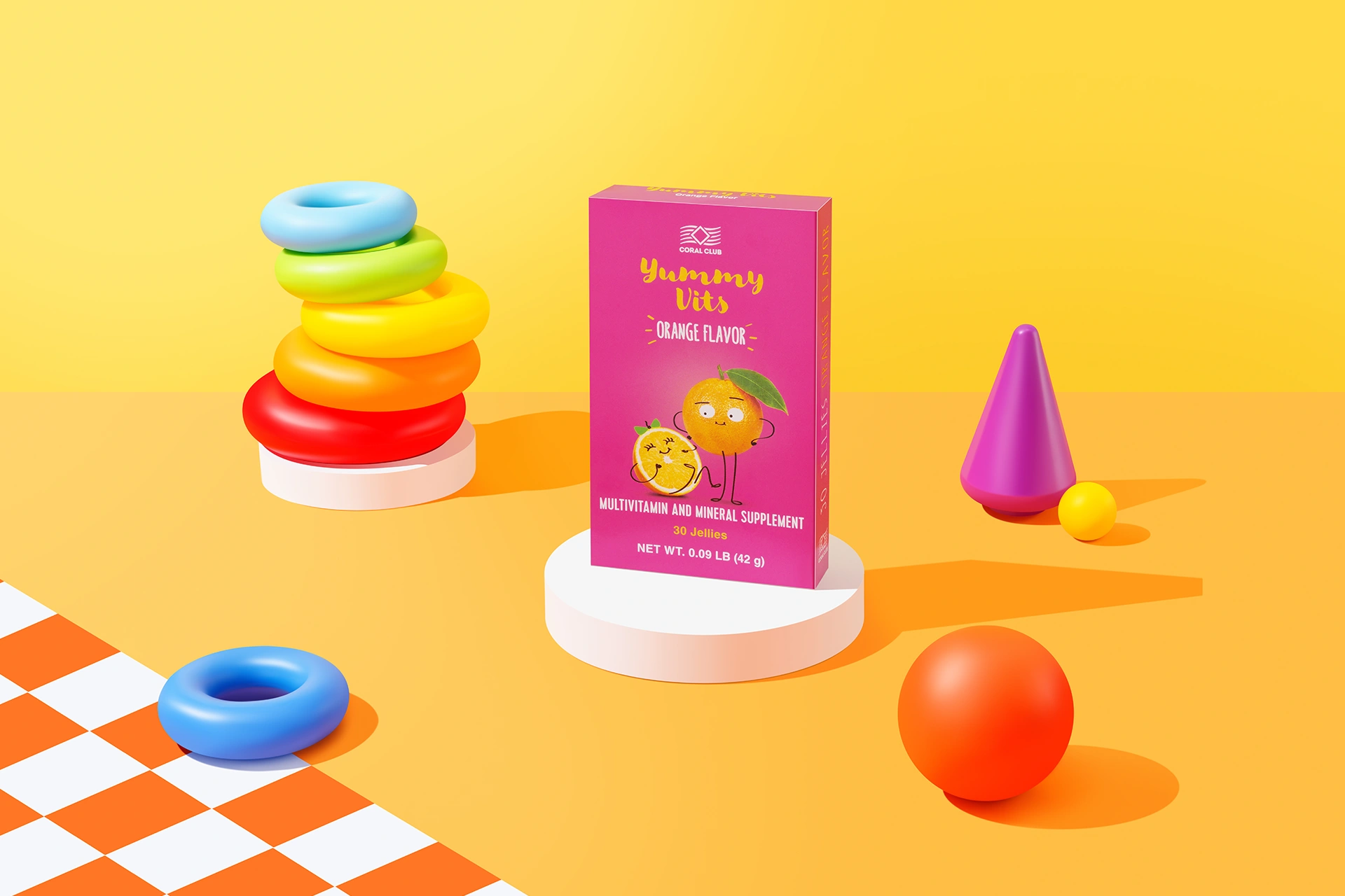 Yummy Vits Orange chewable pastilles packaging on a desk next to a child studying